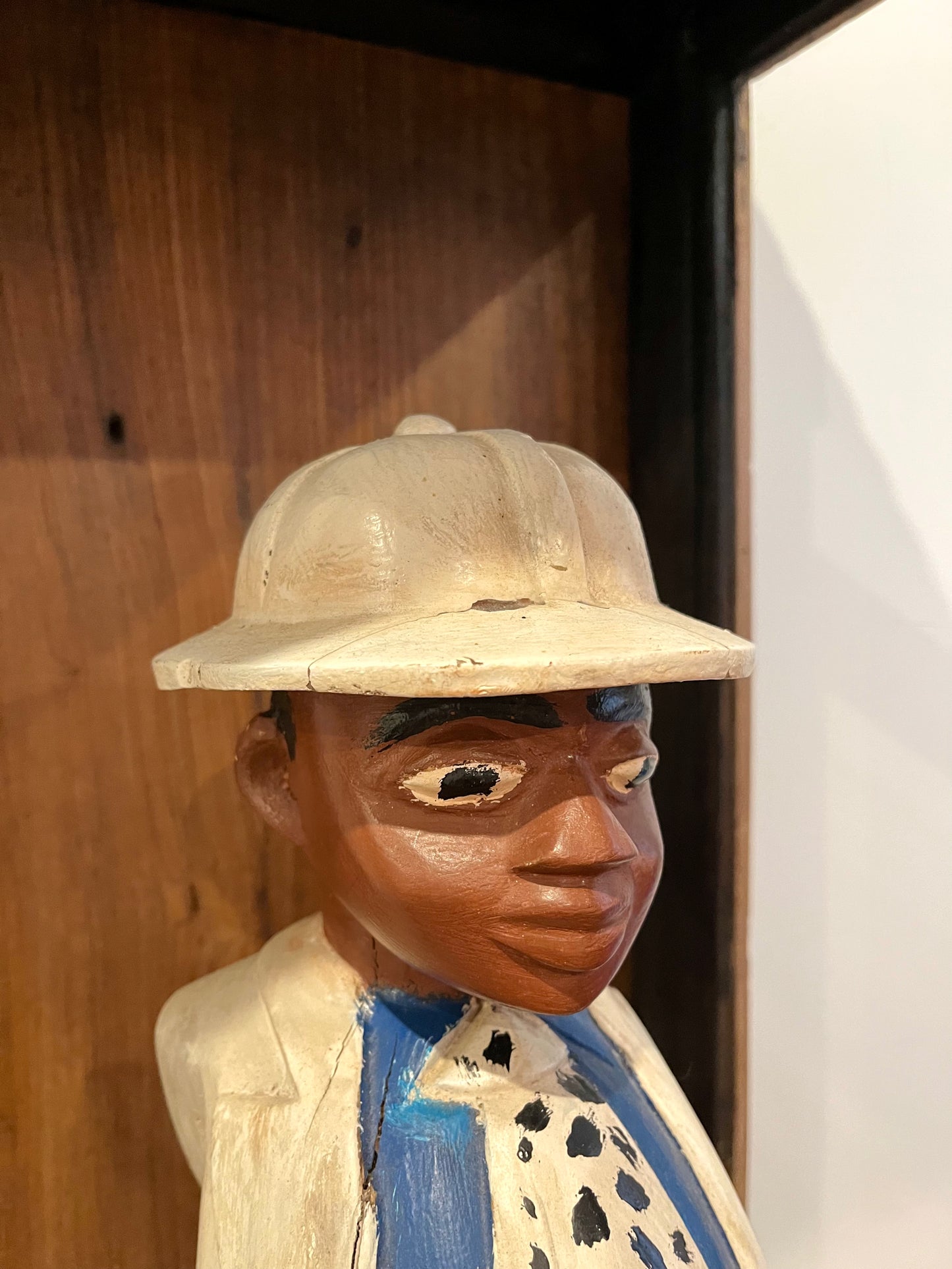 Vintage Wooden Display Cabinet with Wooden Figurine