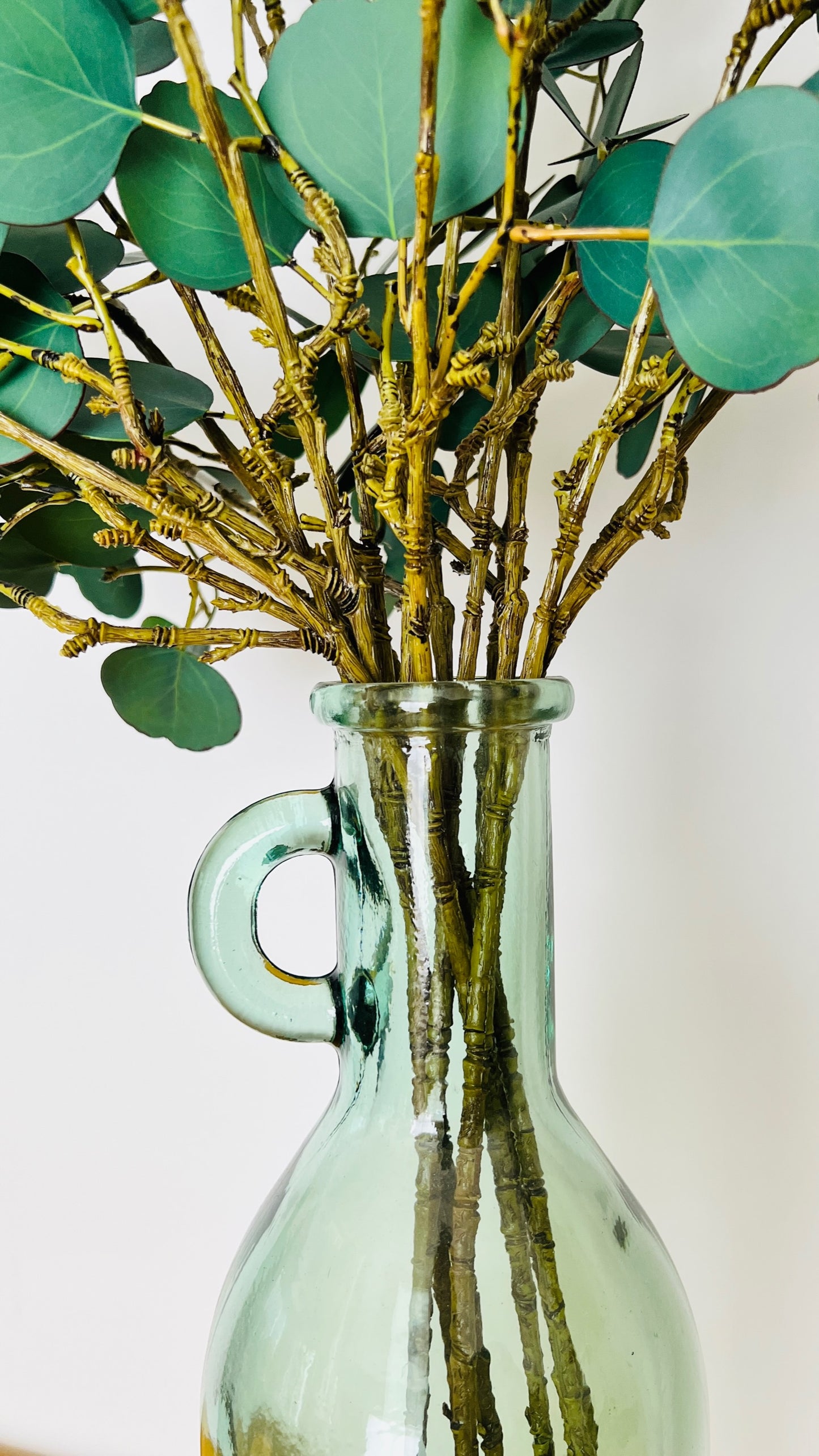 Tall Glass Le Forge Vase with Faux Eucalyptus Branches