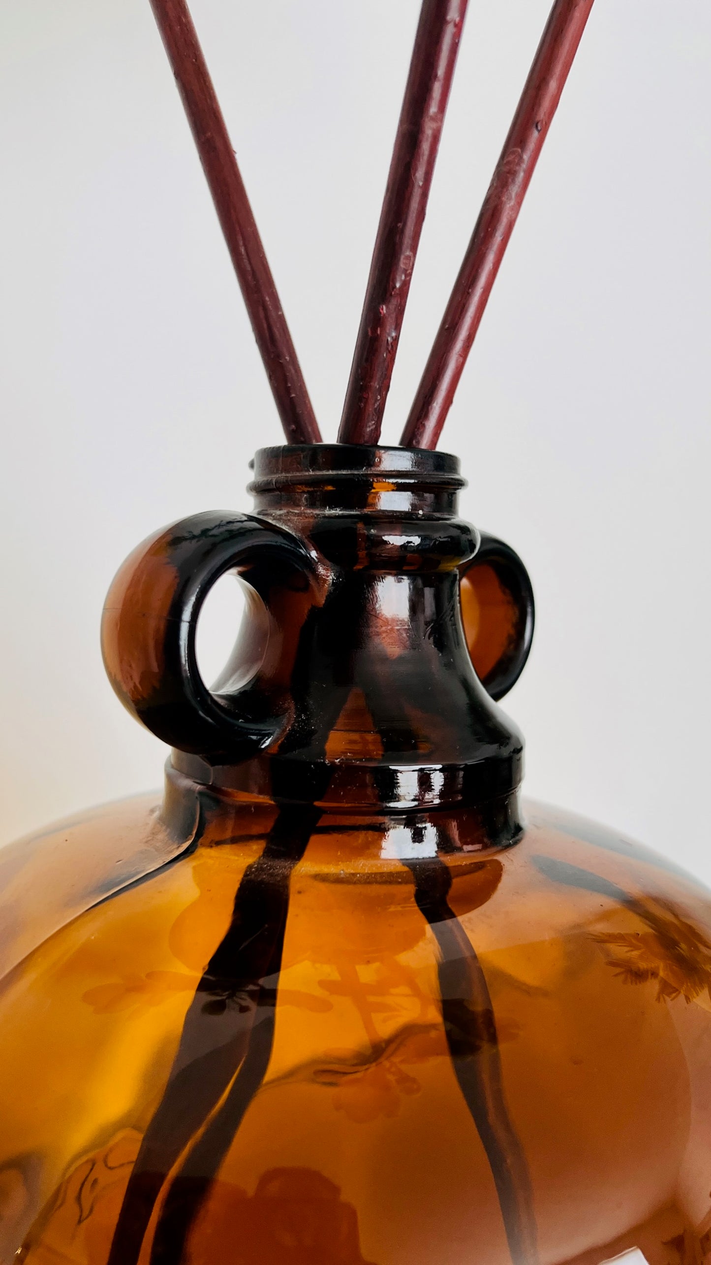 Lovely Amber Jar Vase with Tall Yellow Magnolia Stems