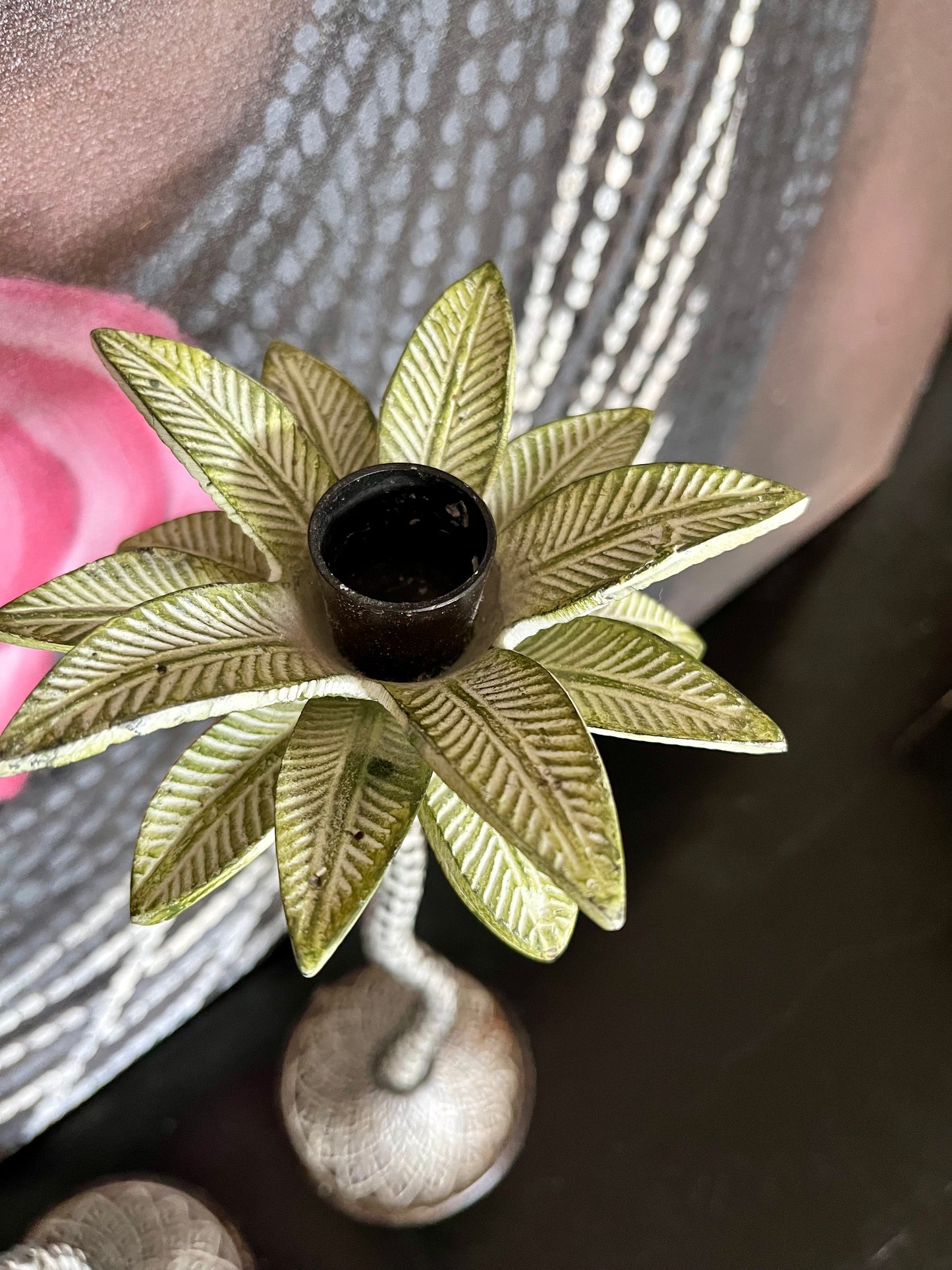 A Beautiful Pair of Metal Palm Tree Candlesticks