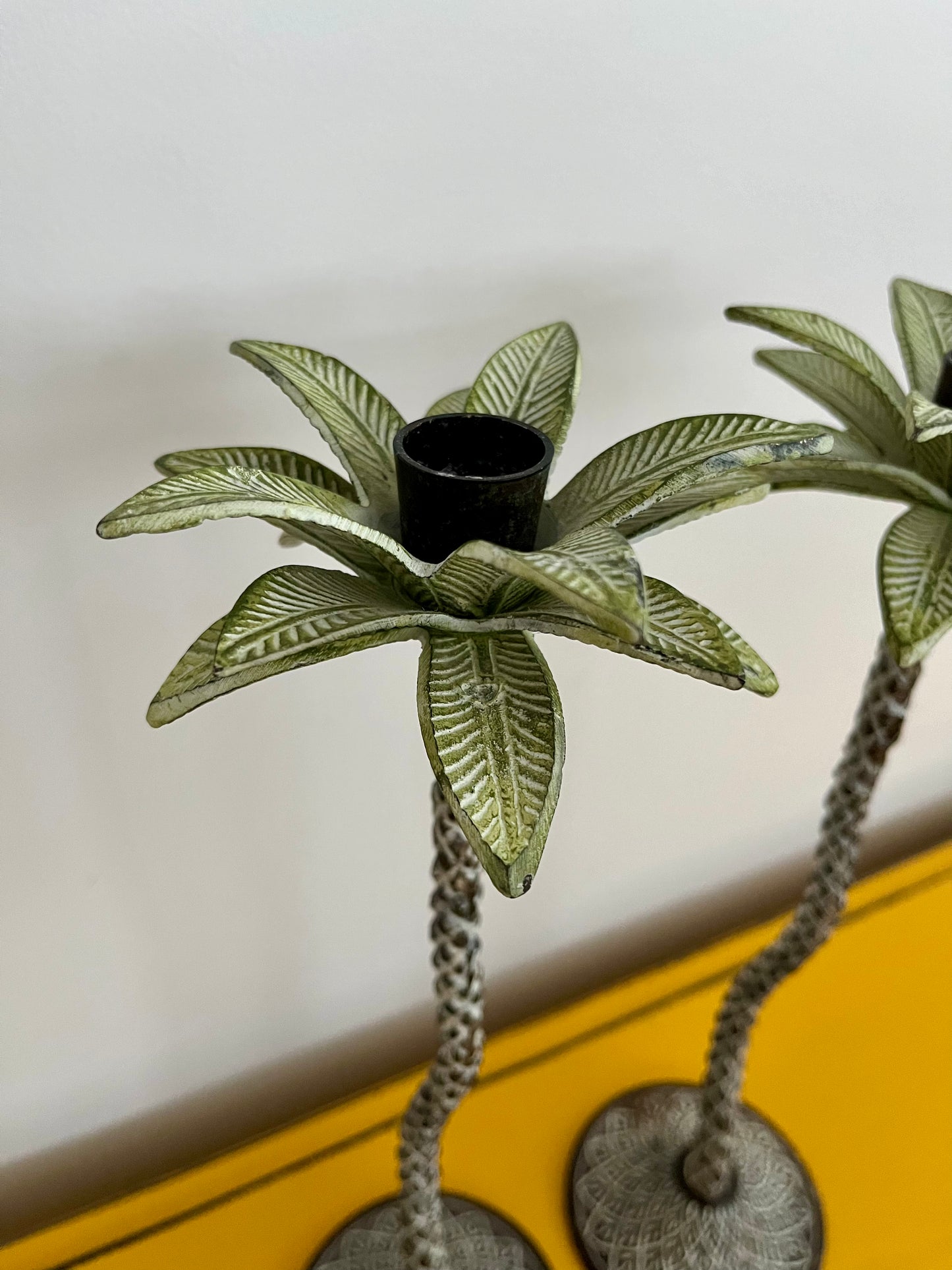 A Beautiful Pair of Metal Palm Tree Candlesticks
