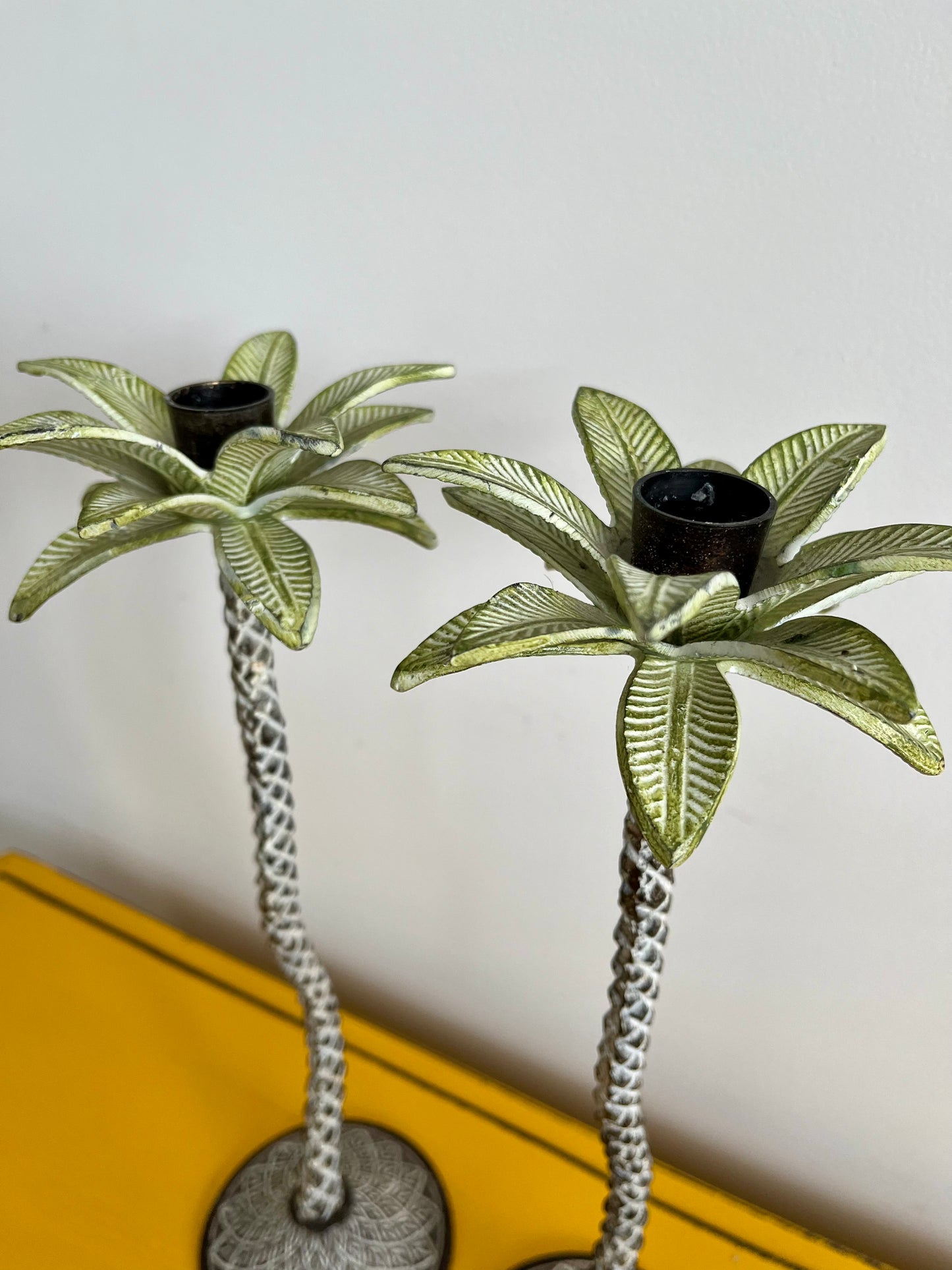 A Beautiful Pair of Metal Palm Tree Candlesticks