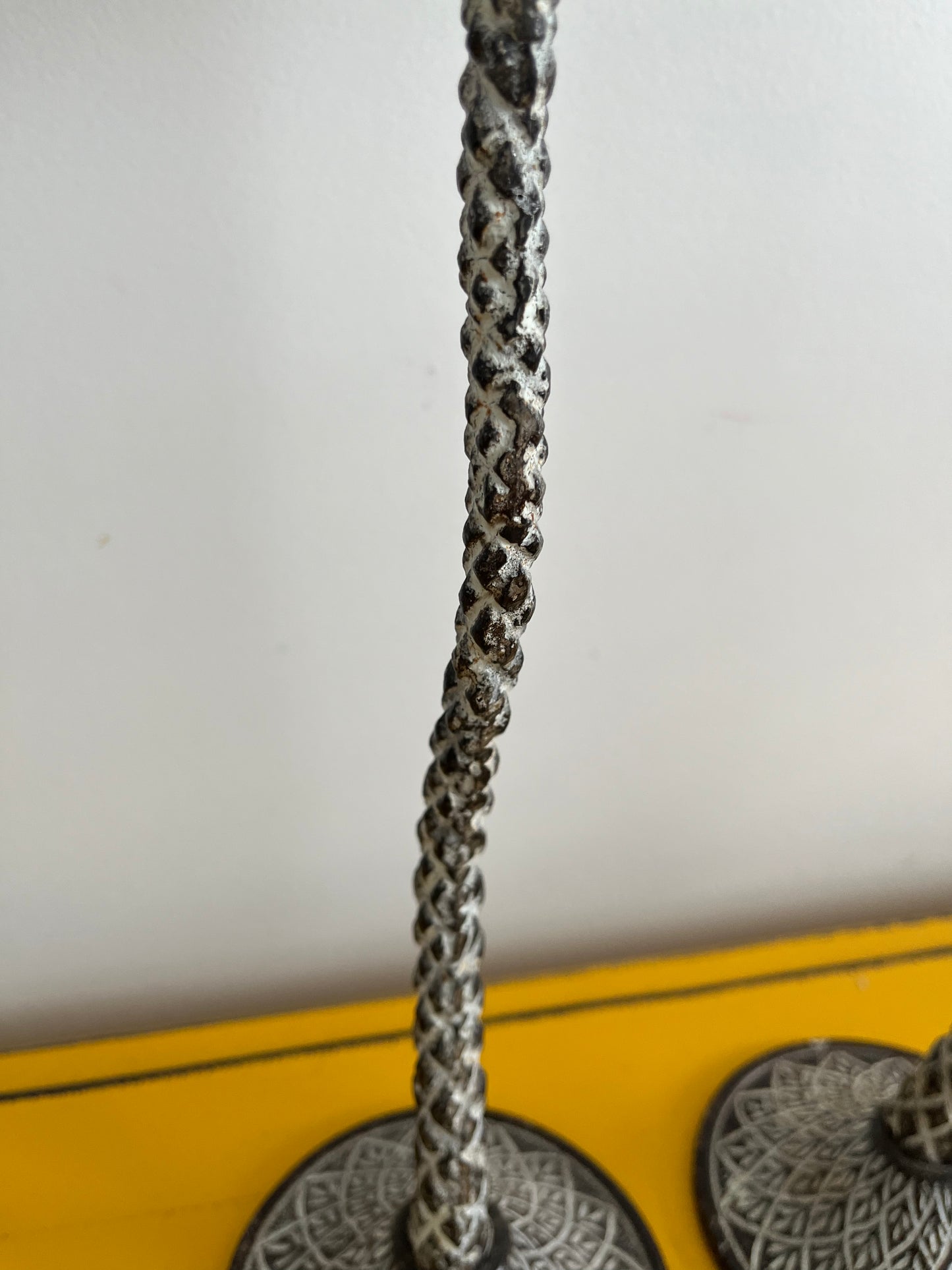 A Beautiful Pair of Metal Palm Tree Candlesticks