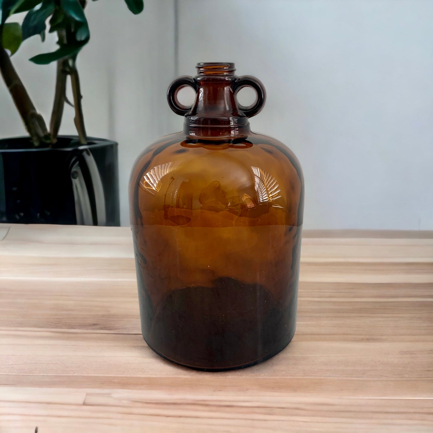 Lovely Amber Jar Vase with Tall Yellow Magnolia Stems